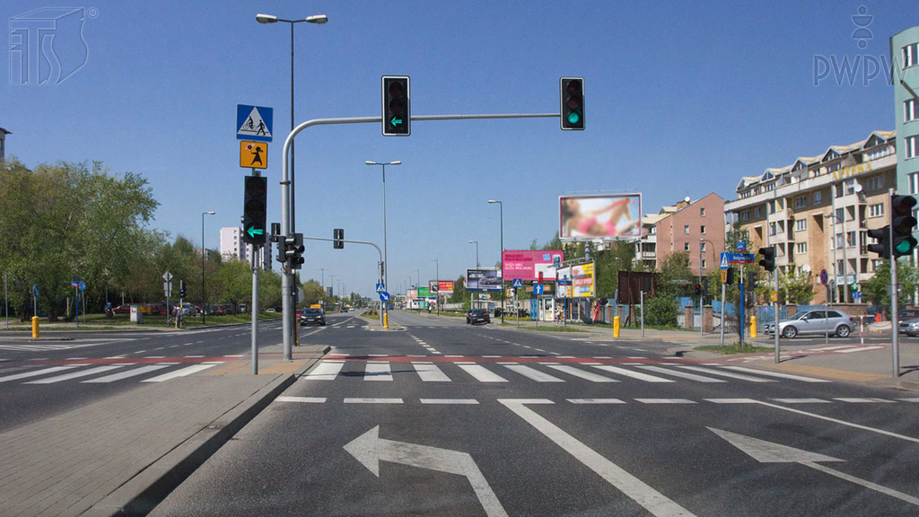 Does the light displayed over your lane oblige you to stop before the traffic light post?